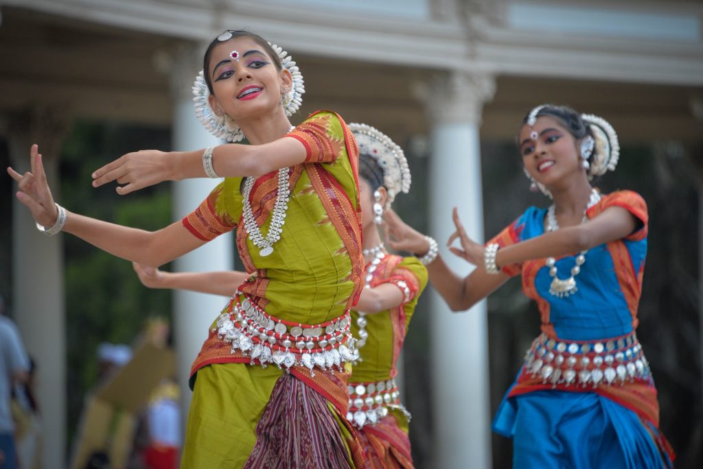 Cultural dance by ladies.
Cultural immersion is one of the ways to achieve personal growth and Transformation. Traveling meaningfully provides such opportunities. Photo by Pavan Gupta on Unsplash.
